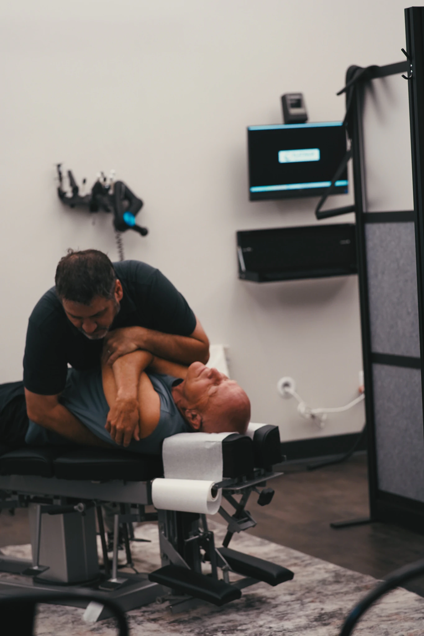 A patient being evaluated and adjusted by an HFW doctor